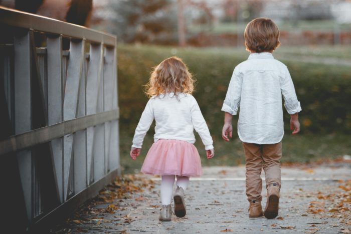 Two children walking in Altrincham